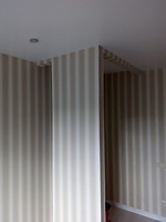 Поклейка обоев.